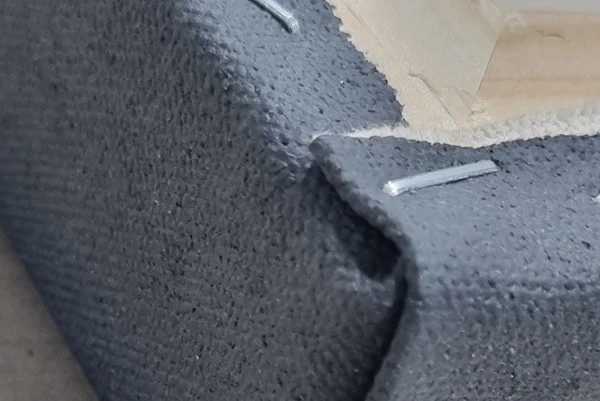 staples on stretched canvas artwork